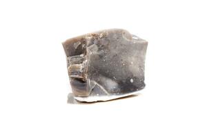 Macro mineral stone Flint in the rock on a white background photo