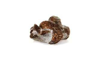 macro mineral stone Staurolite on a white background photo