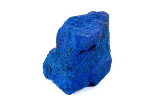 Macro Azurite mineral stone with Pyrite inserts on a white background photo