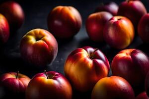 Examine nectarines close in a photography studio with a dark background photo