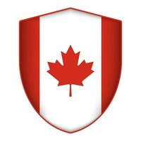 Canada flag in shield shape. Vector illustration.