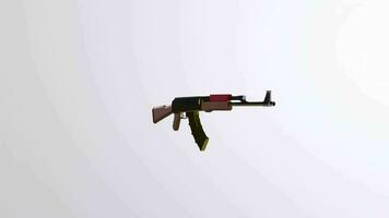 an ak - 47 with a red handle and a black barrel video
