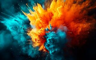 Blue and orange colored powder explosions over black background. Holi paint powder splash. photo