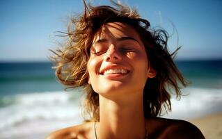 Young woman breathing fresh air in the beach. photo