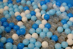 Blue, white, clear, little plastic balls for children to playground photo