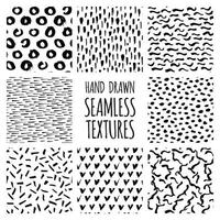 hand drawn seamless textures set vector