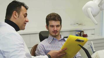 Young man having medical appointment with his dentist video