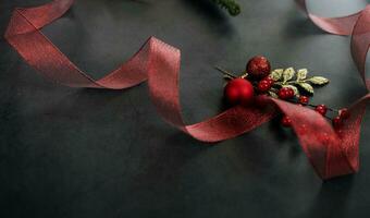 Christmas  ribbons on table photo