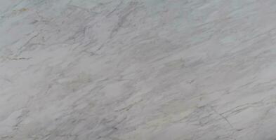 White Stone Marble Texture with Golden Strokes photo