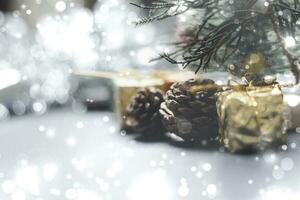 Christmas tree and gift box balls. Bokeh garlands in the blur silver golden background. Developing ideas for the new year 2024. festival of celebration happy. photo