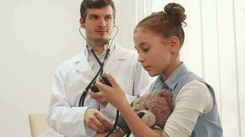 An experienced doctor measures her patient's blood pressure video