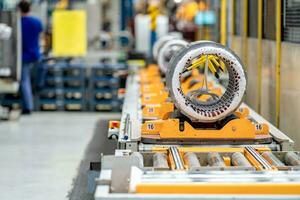 detail of the electric motor on the production line in the factory photo