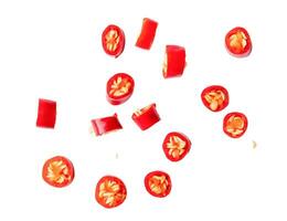 Top view of colorful red chili slices or pieces isolated on white background with clipping path photo