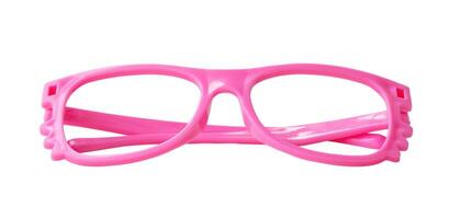 niño juguete de hermosa rosado el plastico lentes para niño jugando aislado en blanco antecedentes con recorte camino foto