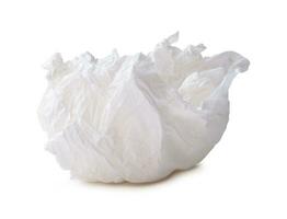 Single white screwed or crumpled tissue paper or napkin in strange shape after use in toilet or restroom isolated on white background with clipping path photo