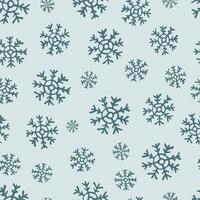 Seamless background of hand drawn snowflakes. Christmas and New Year decoration elements. Vector illustration.