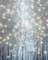 Sparkling silver branches on a light silver blur background, creating a magical. Template for Christmas and New Year cards, social media posts, and website designs. Copy space. Generative AI photo