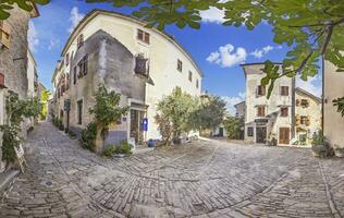 Picture from the town of Groznjan with idyllic cobbled streets and buildings made of natural stone photo