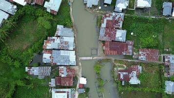 Aerial view of the house by the river video