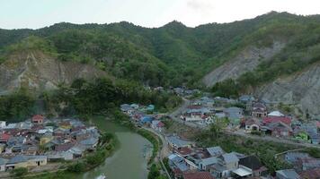 aerial view of the houses and the river in the middle video