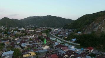 aerial view of the houses and the river in the middle video