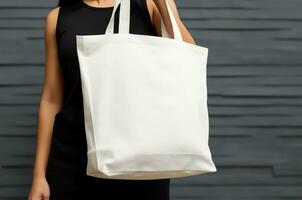 Woman holding blank empty canvas bag for shopping, eco friendly concept, AI Generated photo