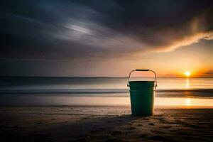 a green bucket on the beach at sunset. AI-Generated photo
