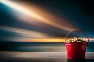 a red bucket with peanuts on a table in front of the ocean. AI-Generated photo
