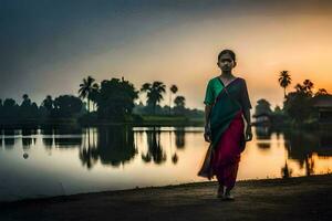 un mujer en un sari soportes por el agua a puesta de sol. generado por ai foto