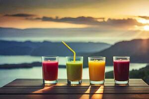 four glasses of juice on a table with the sun setting behind them. AI-Generated photo