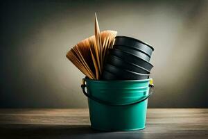 a bucket filled with wooden sticks and a green paintbrush. AI-Generated photo