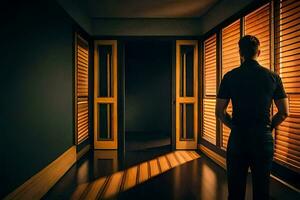 un hombre en pie en un oscuro pasillo con luz de sol viniendo mediante el ventanas generado por ai foto