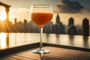 un vaso de naranja jugo en un mesa en frente de un ciudad horizonte. generado por ai foto