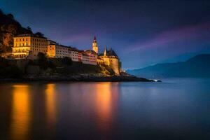 un castillo se sienta en el apuntalar de un lago a noche. generado por ai foto