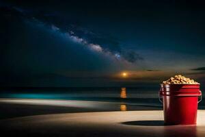 a bucket of peanuts on the beach at night. AI-Generated photo