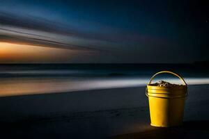 un amarillo Cubeta sentado en el playa a noche. generado por ai foto