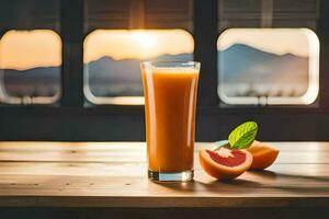 a glass of orange juice on a table with a view of the mountains. AI-Generated photo