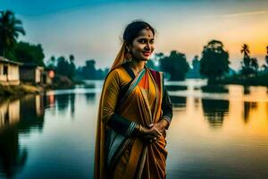 un mujer en un sari en pie por el agua a puesta de sol. generado por ai foto