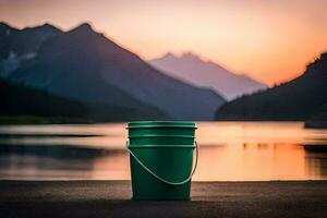 a green bucket sits on the ground near a lake. AI-Generated photo