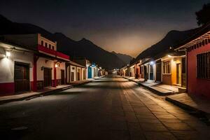 un calle en el medio de un pueblo a noche. generado por ai foto