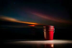 a red bucket sitting on a dark floor at night. AI-Generated photo