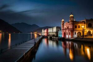 a pier in front of a building at night. AI-Generated photo