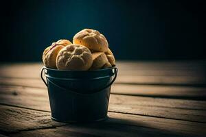 un Cubeta lleno con galletas en un de madera mesa. generado por ai foto