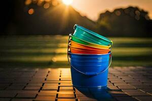 a bucket of colorful buckets sitting on a brick walkway. AI-Generated photo