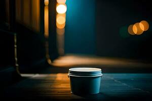 a white cup sitting on the ground in front of a building. AI-Generated photo