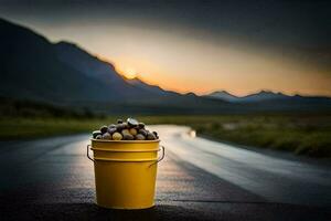 a bucket of nuts on the road at sunset. AI-Generated photo
