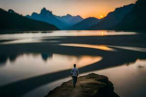 a man standing on a cliff overlooking a lake at sunset. AI-Generated photo