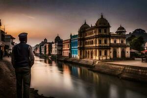 un hombre soportes en el banco de un río en India. generado por ai foto