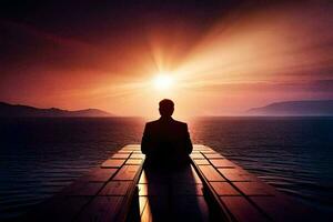 a man sitting on a dock looking at the sun. AI-Generated photo