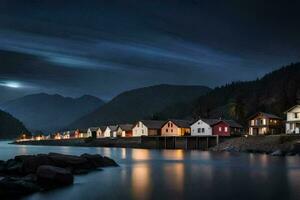 un fila de casas en el apuntalar de un lago a noche. generado por ai foto